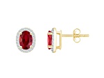 7x5mm Oval Created Ruby And Created White Sapphire 10k Yellow Gold Halo Stud Earrings