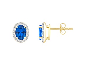 7x5mm Oval Created Sapphire And Created White Sapphire 10k Yellow Gold Halo Stud Earrings