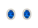 7x5mm Oval Created Sapphire And Created White Sapphire 10k Yellow Gold Halo Stud Earrings