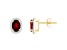 7x5mm Oval Garnet And Created White Sapphire 10k Yellow Gold Halo Stud Earrings