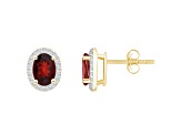 7x5mm Oval Garnet And Created White Sapphire 10k Yellow Gold Halo Stud Earrings