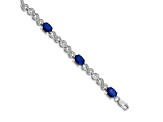 Rhodium Over 10k White Gold Diamond and Sapphire Infinity Bracelet