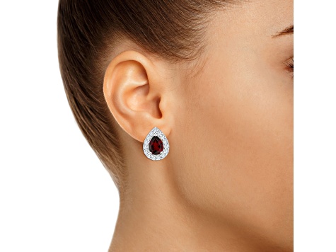 8x5mm Pear Shape Garnet And White Topaz Accent Rhodium Over Sterling Silver Halo Stud Earrings
