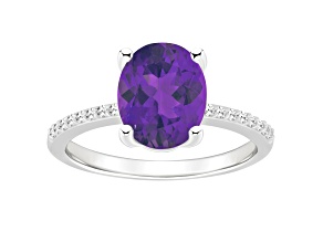 10x8mm Oval Amethyst and 1/10 ctw Diamond Rhodium Over Sterling Silver Ring
