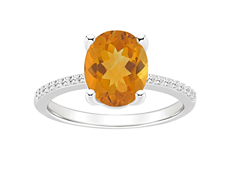 10x8mm Oval Citrine and 1/10 ctw Diamond Rhodium Over Sterling Silver Ring