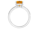 10x8mm Oval Citrine and 1/10 ctw Diamond Rhodium Over Sterling Silver Ring