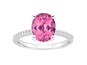 10x8mm Oval Pink Topaz and 1/10 ctw Diamond Rhodium Over Sterling Silver Ring