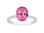 10x8mm Oval Pink Topaz and 1/10 ctw Diamond Rhodium Over Sterling Silver Ring