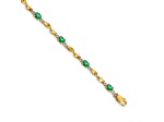 14k Yellow Gold and Rhodium Over 14k Yellow Gold Diamond and Oval Emerald Bracelet