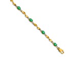 14k Yellow Gold and Rhodium Over 14k Yellow Gold Diamond and Oval Emerald Bracelet