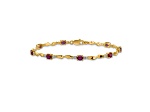 14k Yellow Gold and Rhodium Over 14k Yellow Gold Diamond and Oval Ruby Bracelet