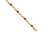 14k Yellow Gold and Rhodium Over 14k Yellow Gold Diamond and Oval Ruby Bracelet