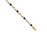 14k Yellow Gold and Rhodium Over 14k Yellow Gold Diamond and Oval Sapphire Bracelet