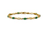 14k Yellow Gold and Rhodium Over 14k Yellow Gold Diamond and Emerald Bracelet