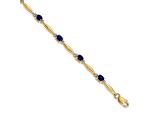 14k Yellow Gold and Rhodium Over 14k Yellow Gold Diamond and Oval Sapphire Bracelet