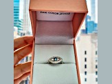 Blue Topaz with Moissanite Accents Rhodium Over Sterling Silver Evil Eye Halo Ring