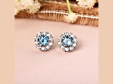 Round Blue Topaz with Moissanite Accents Rhodium Over Sterling Silver Halo Earrings