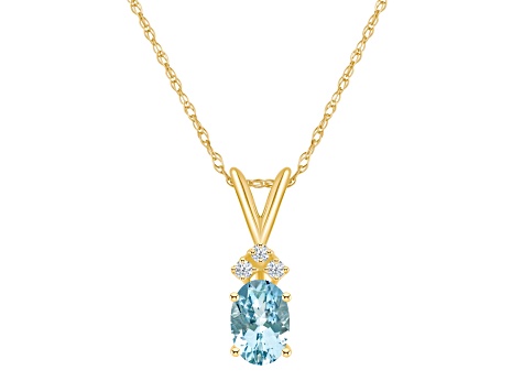 7x5mm Oval Aquamarine with Diamond Accents 14k Yellow Gold Pendant With Chain