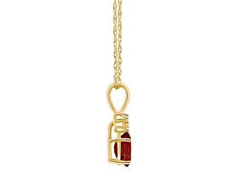 7x5mm Oval Garnet with Diamond Accents 14k Yellow Gold Pendant With Chain