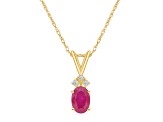 7x5mm Oval Ruby with Diamond Accents 14k Yellow Gold Pendant With Chain