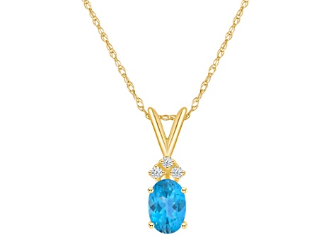 7x5mm Oval Blue Topaz with Diamond Accents 14k Yellow Gold Pendant With Chain