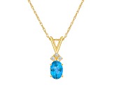 7x5mm Oval Blue Topaz with Diamond Accents 14k Yellow Gold Pendant With Chain