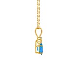 7x5mm Oval Blue Topaz with Diamond Accents 14k Yellow Gold Pendant With Chain