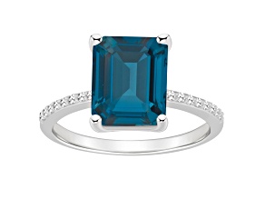 10x8mm Emerald Cut London Blue Topaz and 1/10 ctw Diamond Rhodium Over Sterling Silver Ring
