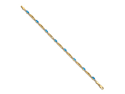 14k Yellow Gold and Rhodium Over 14k Yellow Gold Blue Topaz and Diamond Bracelet