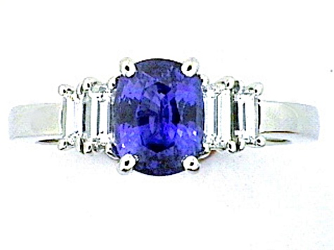 Oval Blue Sapphire and White Diamond Platinum Ring. 2.58 CTW