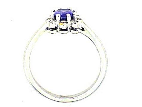 Oval Blue Sapphire and White Diamond Platinum Ring. 1.06 CTW
