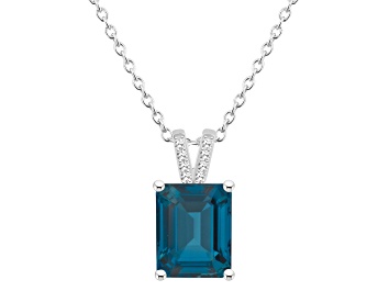 Picture of 10x8mm Emerald Cut London Blue Topaz With Diamond Accents Rhodium Over Sterling Pendant with Chain