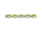 Green Peridot Rhodium Over Sterling Silver Oval Tennis Bracelet 8.61ctw