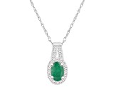 6x4mm Oval Emerald 1/8 ctw Diamond Rhodium Over Sterling Silver Halo Pendant with Chain