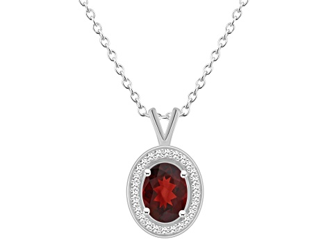 8x6mm Oval Garnet 1/8 ctw Diamond Rhodium Over Sterling Silver Halo Pendant with Chain