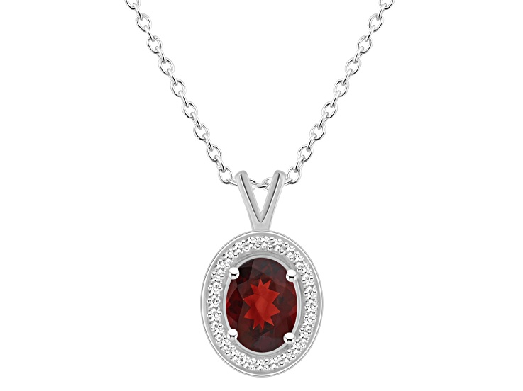 8x6mm Oval Garnet 1/8 ctw Diamond Rhodium Over Sterling Silver Halo Pendant with Chain