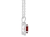 8x6mm Oval Garnet 1/8 ctw Diamond Rhodium Over Sterling Silver Halo Pendant with Chain