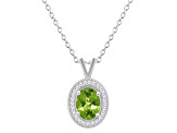 8x6mm Oval Peridot 1/8 ctw Diamond Rhodium Over Sterling Silver Halo Pendant with Chain