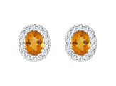 8x6mm Oval Citrine And White Topaz Accent Rhodium Over Sterling Silver Halo Stud Earrings