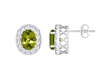 8x6mm Oval Peridot And White Topaz Accent Rhodium Over Sterling Silver Halo Stud Earrings