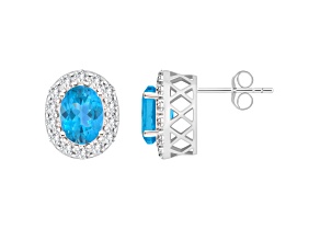 8x6mm Oval Swiss Blue Topaz And White Topaz Accent Rhodium Over Sterling Silver Halo Stud Earrings