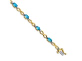 14k Yellow and White Gold with Rhodium Over 14k Yellow Gold Blue Topaz and Diamond Infinity Bracelet