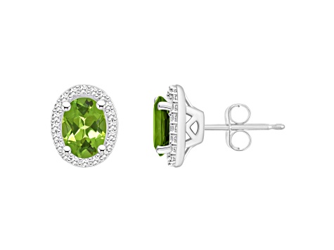 7x5mm Oval Peridot 1/5 ctw Diamond Rhodium Over Sterling Silver Halo Stud Earrings