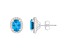 7x5mm Oval Blue Topaz 1/5 ctw Diamond Rhodium Over Sterling Silver Halo Stud Earrings