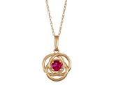 Round Lab Created Ruby 10K Yellow Gold Swirl Pendant 0.17ctw