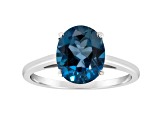 10x8mm Oval London Blue Topaz Rhodium Over Sterling Silver Ring