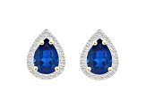 7x5mm Pear Shape Created Sapphire And Created White Sapphire 10k Yellow Gold Halo Stud Earrings