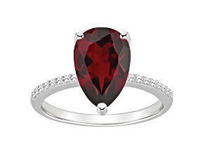 12x8mm Pear Shape Garnet and 1/10 ctw Diamond Rhodium Over Sterling Silver Ring
