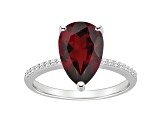 12x8mm Pear Shape Garnet and 1/10 ctw Diamond Rhodium Over Sterling Silver Ring