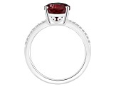 12x8mm Pear Shape Garnet and 1/10 ctw Diamond Rhodium Over Sterling Silver Ring